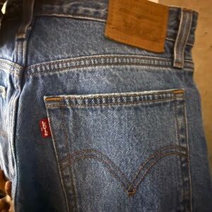 Levi's Women's Straight Jeans in Blue with Brown Patch and Red Tab